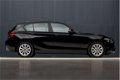 BMW 1-serie - 116i High Executive Sport (NAVIGATIE, XENON, CRUISE, SPORTSTOELEN, PDC, CLIMATE, LM VE - 1 - Thumbnail