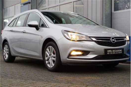 Opel Astra Sports Tourer - 1.4 TURBO 150PK ONLINE EDITION+ | NAVI | CLIMA | LED | PDC | ONSTAR | CAM - 1