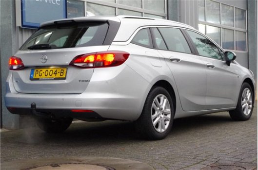 Opel Astra Sports Tourer - 1.4 TURBO 150PK ONLINE EDITION+ | NAVI | CLIMA | LED | PDC | ONSTAR | CAM - 1