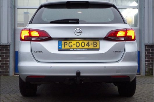 Opel Astra Sports Tourer - 1.4 TURBO 150PK ONLINE EDITION+ | NAVI | CLIMA | LED | PDC | ONSTAR | CAM - 1