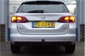 Opel Astra Sports Tourer - 1.4 TURBO 150PK ONLINE EDITION+ | NAVI | CLIMA | LED | PDC | ONSTAR | CAM - 1 - Thumbnail