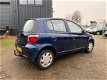 Toyota Yaris - 1.3-16V VVT-i YORIN ( 5 DRS / LAGE KM / NAP / APK / AIRCO ) - 1 - Thumbnail