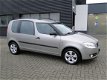 Skoda Roomster - 1.2 Style Airco nette auto met boekjes - 1 - Thumbnail