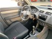 Suzuki Swift - 1.3 Exclusive Airco deurs - 1 - Thumbnail