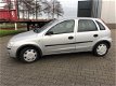 Opel Corsa - 1.2-16V Rhythm airco/apk/5 drs - 1 - Thumbnail