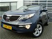 Kia Sportage - PLUS PACK SUV HOGE INSTAP 61 DKM AIRCO CRUISE CONTROL LED LMV PDC CHROOM DAKRAIL - 1 - Thumbnail