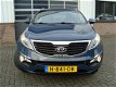 Kia Sportage - PLUS PACK SUV HOGE INSTAP 61 DKM AIRCO CRUISE CONTROL LED LMV PDC CHROOM DAKRAIL - 1 - Thumbnail