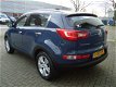 Kia Sportage - PLUS PACK SUV HOGE INSTAP 61 DKM AIRCO CRUISE CONTROL LED LMV PDC CHROOM DAKRAIL - 1 - Thumbnail