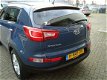 Kia Sportage - PLUS PACK SUV HOGE INSTAP 61 DKM AIRCO CRUISE CONTROL LED LMV PDC CHROOM DAKRAIL - 1 - Thumbnail