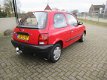 Nissan Micra - 1.0 L AUTOMAAT [ Stuurbekrachtiging, trekhaak, audio ] - 1 - Thumbnail