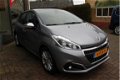 Peugeot 208 - 1.2 Signature Airco/Cruise/LMV/LED - 1 - Thumbnail