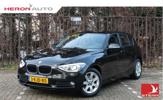 BMW 1-serie - 114i Upgrade Edition | 5drs. | navi | leer | xenon | trekhaak - 1