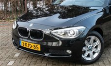BMW 1-serie - 114i Upgrade Edition | 5drs. | navi | leer | xenon | trekhaak