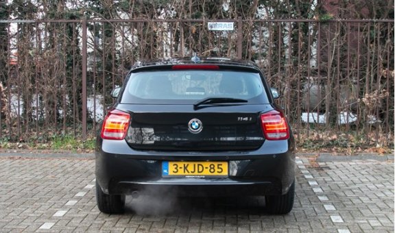 BMW 1-serie - 114i Upgrade Edition | 5drs. | navi | leer | xenon | trekhaak - 1