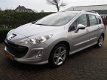 Peugeot 308 SW - 1.6 HDiF XS Première | 7-persoons| Panormadak| Climate contr| Cruise contr| Electr. - 1 - Thumbnail