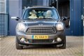 Mini Mini Countryman - 1.6 120pk 69.799km Leder Pano Stoelverwarming - 1 - Thumbnail