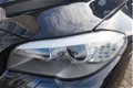 BMW 5-serie Touring - 520i High Executive Leer / automaat / panoramadak / navigatie / - 1 - Thumbnail