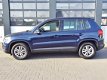 Volkswagen Tiguan - 1.4 TSI 118KW BMT AUTOMAAT/NAVIGATIE/CAMERA/TREKHAAK 35.000 KM - 1 - Thumbnail