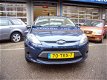 Ford Fiesta - 1.25 Limited airco 5 deurs slechts 24330 km - 1 - Thumbnail