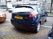 Ford Fiesta - 1.25 Limited airco 5 deurs slechts 24330 km - 1 - Thumbnail