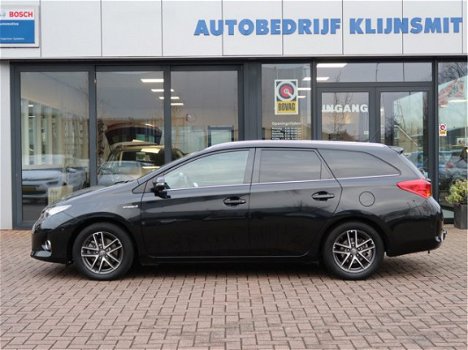 Toyota Auris Touring Sports - 1.8 Hybrid Dynamic | pano'dak | navi | trekhaak | led | - 1