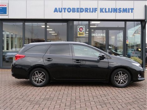 Toyota Auris Touring Sports - 1.8 Hybrid Dynamic | pano'dak | navi | trekhaak | led | - 1