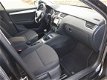 Skoda Octavia Combi - 1.6 TDI Businessline Navi / Clima / Lmv / Blanke dakrails / + PAKKET - 1 - Thumbnail