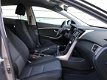 Hyundai i30 - 1.4i i-Drive Cool Airco, Elektr. ramen, Cruise control, APK t/m 2021 - 1 - Thumbnail