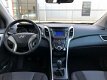 Hyundai i30 - 1.4i i-Drive Cool Airco, Elektr. ramen, Cruise control, APK t/m 2021 - 1 - Thumbnail