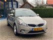 Kia Cee'd Sporty Wagon - 1.4 CVVT X-ecutive 1e Eig. Clima Cruise Navi NL-Auto NAP Dealer Onderhouden - 1 - Thumbnail