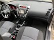 Kia Cee'd Sporty Wagon - 1.4 CVVT X-ecutive 1e Eig. Clima Cruise Navi NL-Auto NAP Dealer Onderhouden - 1 - Thumbnail