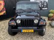 Jeep Wrangler - 4.0i -LIKE NEW - 1 - Thumbnail