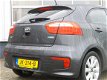 Kia Rio - 1.2 CVVT DynamicLine *NAVIGATIE/TREKHAAK - 1 - Thumbnail