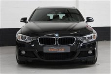 BMW 3-serie Touring - 320d Upgrade Edition |M-pakket|head-up|elektrische achterklep|bi-xenon|