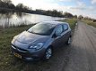Opel Corsa - 1.4 Online Edition 5 drs navigatie - 1 - Thumbnail