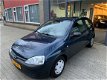 Opel Corsa - 1.2-16V Nieuwe APK NAP 2de Eigenaar - 1 - Thumbnail