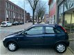 Opel Corsa - 1.2-16V Nieuwe APK NAP 2de Eigenaar - 1 - Thumbnail