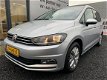 Volkswagen Touran - 1.6 TDI 110PK COMFORTLINE NAVI/TREKHAAK/PDC/ - 1 - Thumbnail