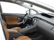 Toyota Prius - 1.8 Full Hybrid 136PK Aut. (LEDER/NAVI/HUD/STOELVER) - 1 - Thumbnail