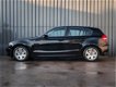 BMW 1-serie - 116i, 5 Drs, Business Line, PDC V+A, Xenon, Goed Onderhouden, Black-Edition - 1 - Thumbnail