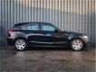 BMW 1-serie - 116i, 5 Drs, Business Line, PDC V+A, Xenon, Goed Onderhouden, Black-Edition - 1 - Thumbnail