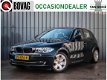 BMW 1-serie - 116i, 5 Drs, Business Line, PDC V+A, Xenon, Goed Onderhouden, Black-Edition - 1 - Thumbnail