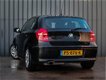 BMW 1-serie - 116i, 5 Drs, Business Line, PDC V+A, Xenon, Goed Onderhouden, Black-Edition - 1 - Thumbnail