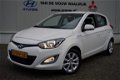 Hyundai i20 - 1.2i i-Deal Airco|Navi|Lichtmetaal - 1 - Thumbnail