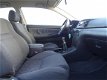 Toyota Corolla - 1.6 VVT-i Linea Terra Nette auto + Airco Nu € 2.499, - 1 - Thumbnail