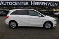 Mercedes-Benz B-klasse - 180 Ambition 50 procent deal 6.475, - ACTIE Schuif-kantel pano dak / Leer / - 1 - Thumbnail