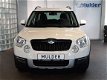 Skoda Yeti - 1.2 TSI 105pk Ambition | Navi | Climate en Cruise-control | PDC | - 1 - Thumbnail