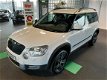 Skoda Yeti - 1.2 TSI 105pk Ambition | Navi | Climate en Cruise-control | PDC | - 1 - Thumbnail