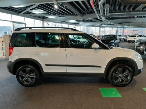 Skoda Yeti - 1.2 TSI 105pk Ambition | Navi | Climate en Cruise-control | PDC | - 1