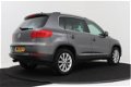 Volkswagen Tiguan - 1.4 TSI Sport&Style | NAVI | Parkeersensoren | Trekhaak - 1 - Thumbnail